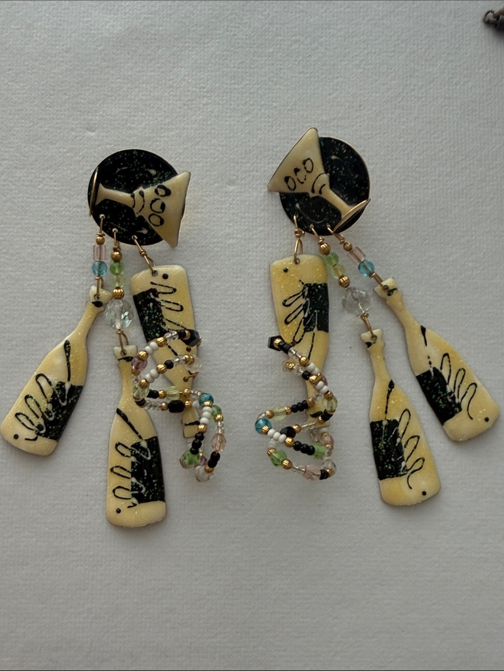 Yellow and Black Beaded Dangle Earrings with Champagne Bottle Charms